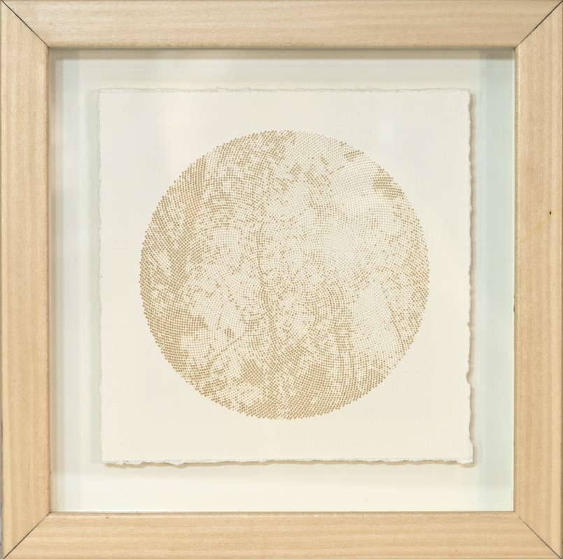 Laser etched image of trees on hand made paper.